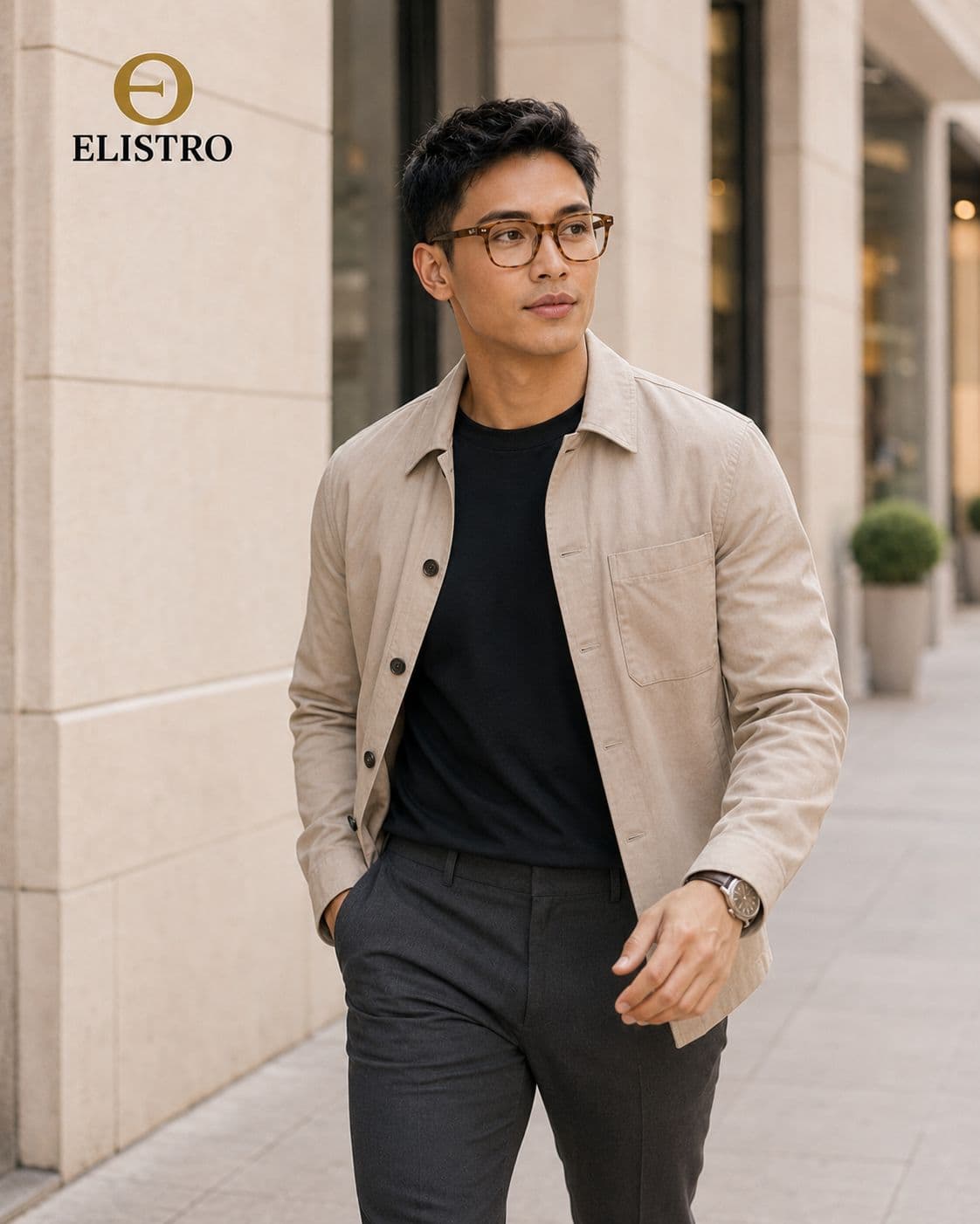 Man wearing tortoiseshell Elistro frames on a city street