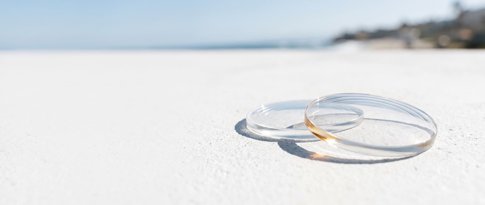 CLIFF lens blanks on a sunlit California coastline